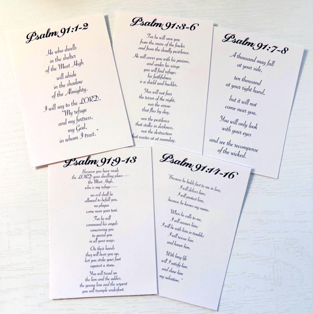 Scripture pages from Psalm 91 on a white background